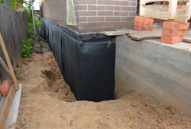 Happy homeowners after waterproofing job in Bladensburg